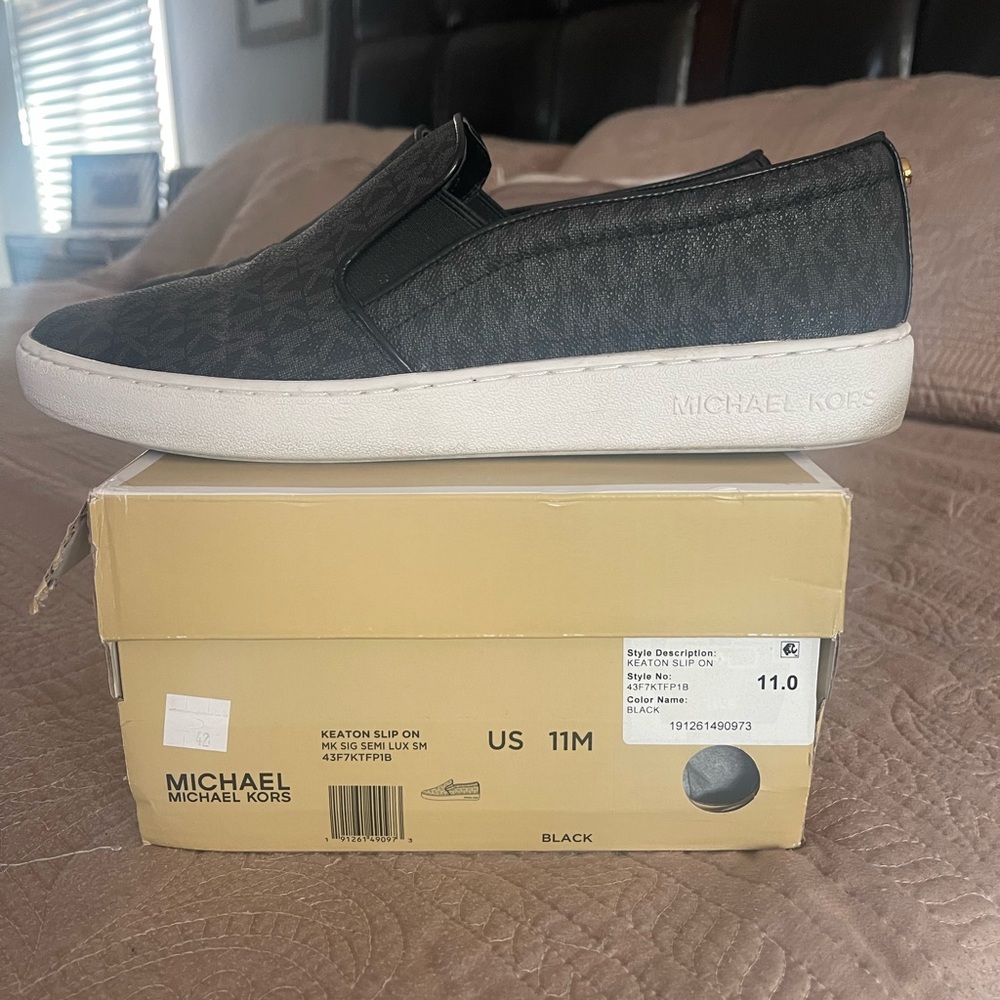 Michael Kors Woman’s Black Keaton Slip-On Sneakers